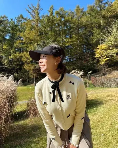 ミニリボンポケットラウンドネックカーディガン